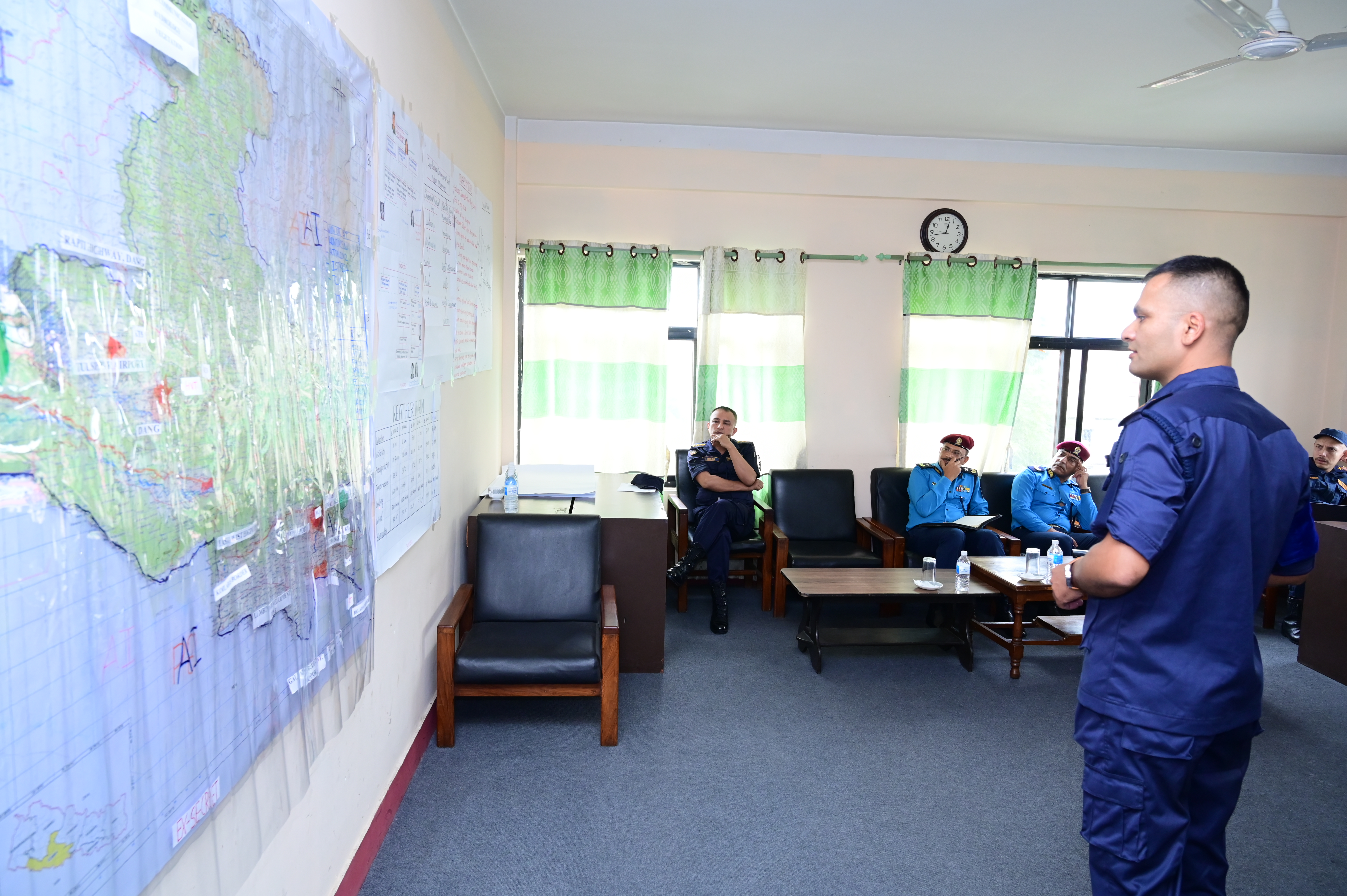 Executive Director of the National Police Academy, AIGP Siddhi Bikram Shah, and Director of the Nepal Police Staff College, DIGP Dinesh Kumar Acharya, together with Senior Instructing Staff (SIS) SSP Ved Bista, reviewing a presentation delivered by a Student Officer of PLSC Batch 02 during EX-CHANAKYA.